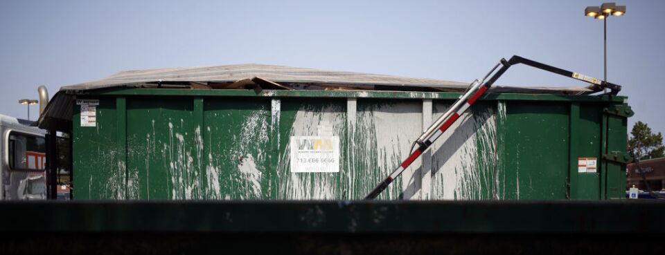 Waste Management Inc. garbage dumpsters in Spring, Texas.